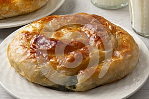 Fresh baked Turkish borek with spinach and cheese close up