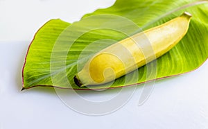 Fresh banana has soft pulpy flesh and yellow skin when ripe with