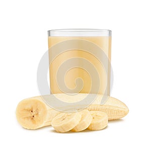 Fresh banana shake in a glass and banana pieces isolated on white background