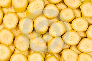 Fresh banana slices background. Top view