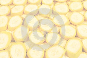 Fresh banana slices background. Top view