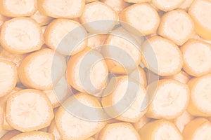 Fresh banana slices background. Top view