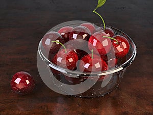 Fresh beautiful cherries in a glass bowl - top down view