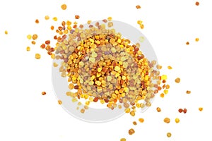 Fresh bee pollen isolated on white background. Top view. Flat lay