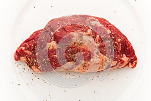 Fresh beef meat on white plate