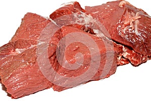 fresh beef red meat chopped isolated on white background ready to be cut and sliced in pieces and cooked in different recipes,