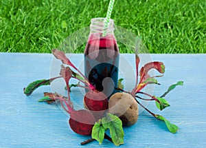 Fresh beet juice with mint leaf in a glass