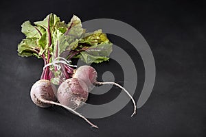 Fresh beetroot bunch on blackboard