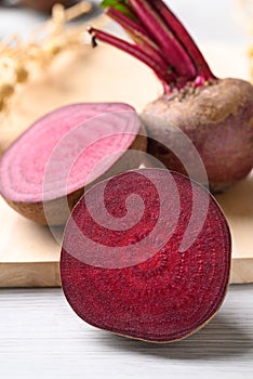 Fresh beetroot on cutting wooden board