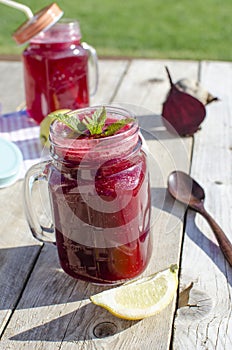 Fresh beetroot juicee on wood table