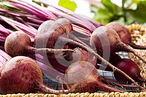 Fresh beets on a wooden board