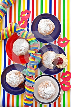Fresh beignets on colorful plates