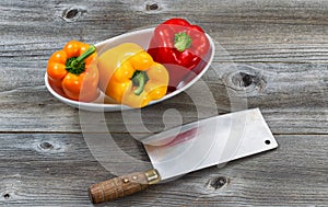 Fresh Bell Peppers in white bowl ready for cleaning