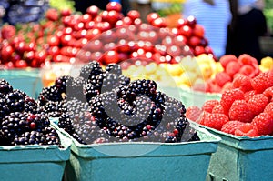 Fresh berries at farmers market photo