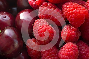 Fresh berries, close-up. Fresh berries of raspberry and cherry