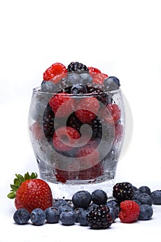 Fresh berries in glass photo