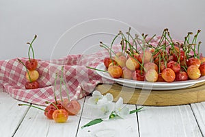 Fresh berries, sweet cherries on white background