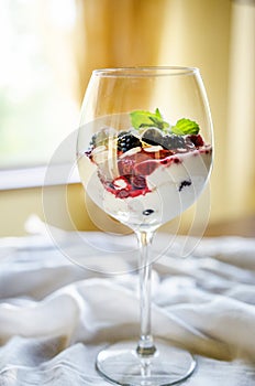 Fresh berries triffle in a glass