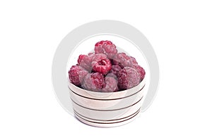 Fresh berries in wood bowl isolated