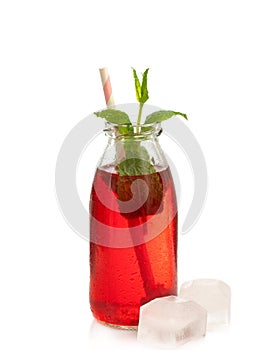 Fresh berry juice with mint and straw