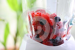 Fresh berry mix in blender