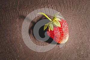 Fresh berry of strawberry on black table/ Strawberry. Fresh berry of strawberry on black table closeup