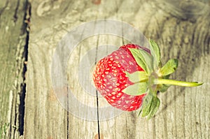 Fresh berry of strawberry on wooden table/fresh berry of strawberry on wooden table closeup