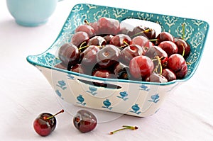 Fresh Bing cherries in square dish