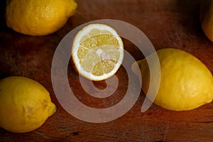 Fresh bio lemons on wood