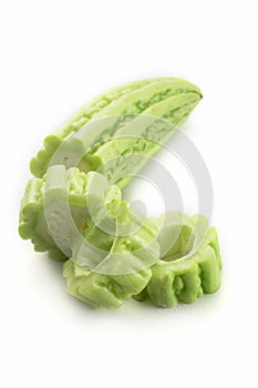 Fresh bitter melon vegetables on white background