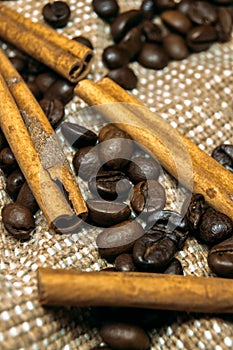 Fresh black coffe beans on cork table