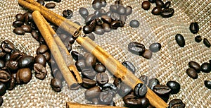 Fresh black coffe beans on cork table