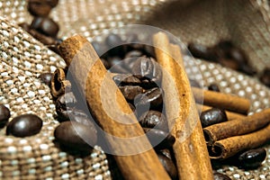 Fresh black coffe beans on cork table