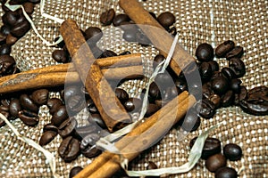 Fresh black coffe beans on cork table