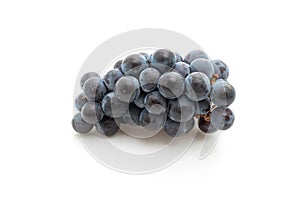 fresh black grapes on white background