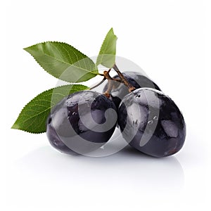 Fresh black olives with leaves on white background