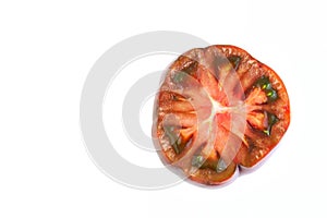 Fresh Black Russian Tomato Cut In Half On White Background