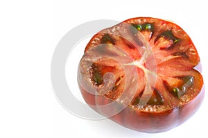 Fresh Black Russian Tomato Cut In Half On White Background