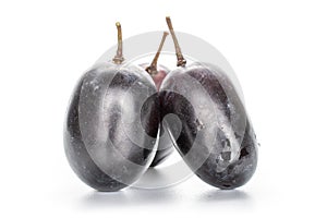 Fresh black wine grape  on white