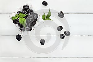 Fresh Blackberries over White Wood Table Top