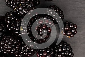 Fresh blackberry on grey stone