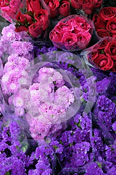 Fresh blossoming flowers display at a daily market