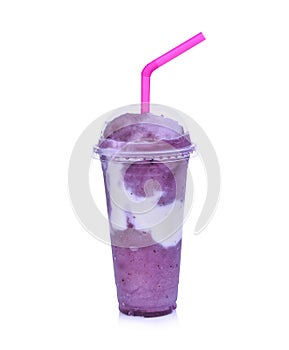 Fresh blue berry smoothie in plastic galss isolated on white