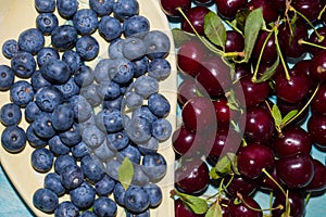 Fresh blueberries and cherries background