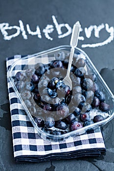 Fresh blueberries and fork photo