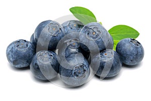 Fresh blueberries with leaves isolated on white