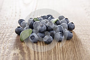 Fresh blueberries on wood