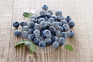 Fresh blueberries on wood