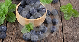 Fresh blueberry on wooden background