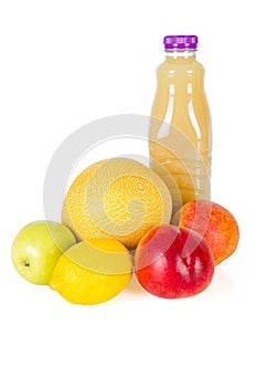 Fresh bottle of juice with fruits isolated on white